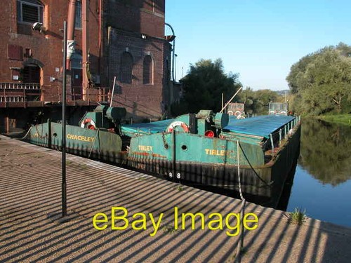 Grain barges moored - , at