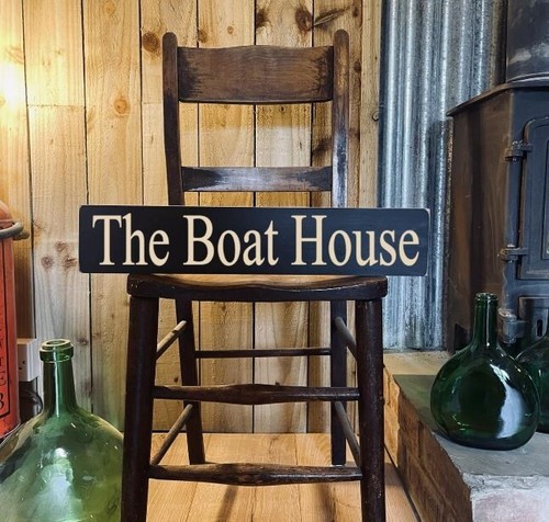 The boat house - sign,